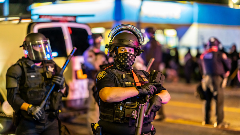 Masked Portland police at a protest.