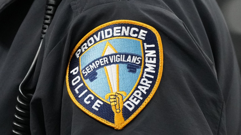 An up close shot of the Providence, Rhode Island police logo on a uniform.