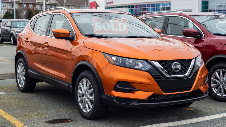 2020 Nissan Rogue sport utility vehicle at a dealership.