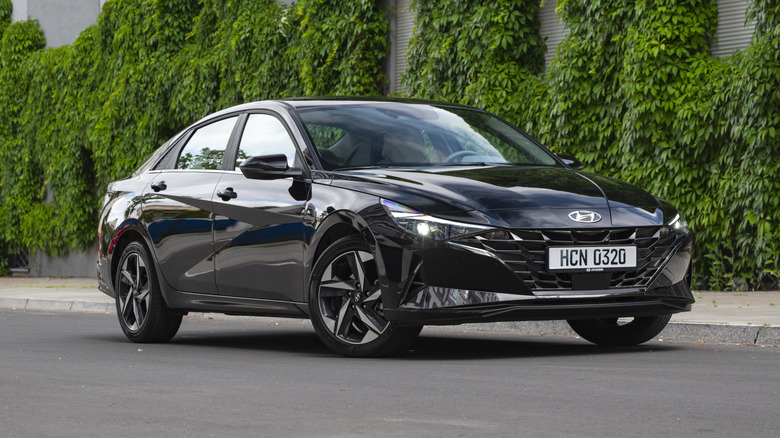 Hyundai Elantra VII stopped on a street.