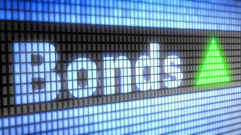 The word BONDS is seen on a digital screen.
