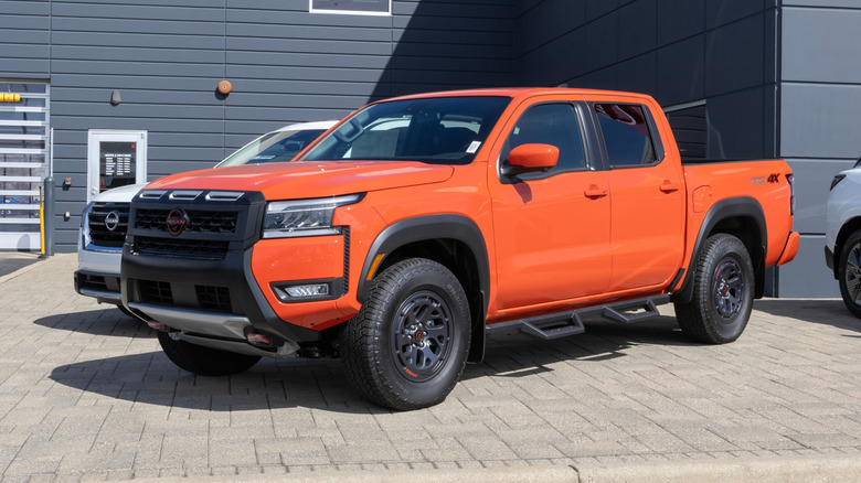 Nissan Frontier Pro-4X Crew Cab 4X4 pickup at a dealership.