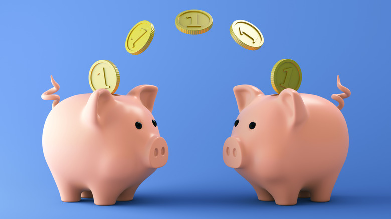 A cartoon of coins going from piggy bank to another to symbolize wealth transfer.