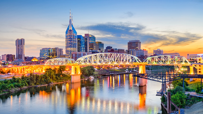 Nashville, Tennessee, USA downtown skyline on the Cumberland River.