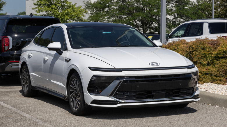 A Hyundai Sonata Limited Hybrid at a dealership.