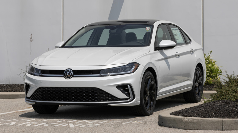 A Volkswagen Jetta 1.5T SE compact sedan display.