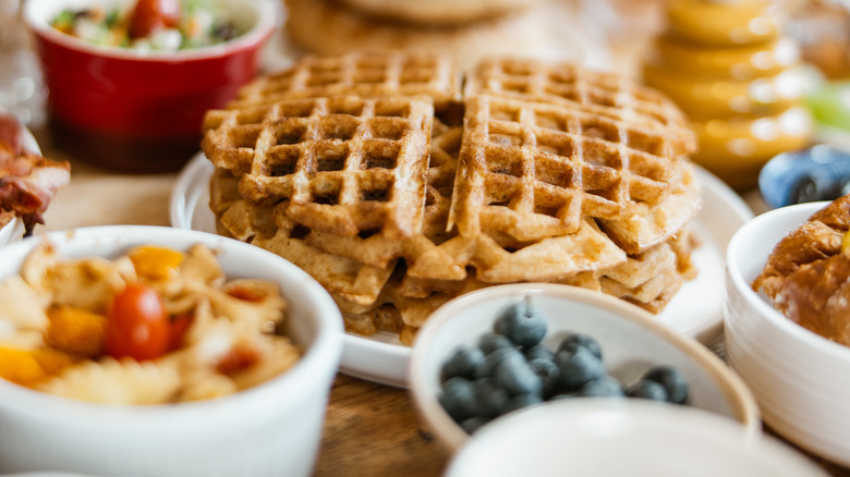 Variety of fresh food served on the kitchen table, ready for brunch.
