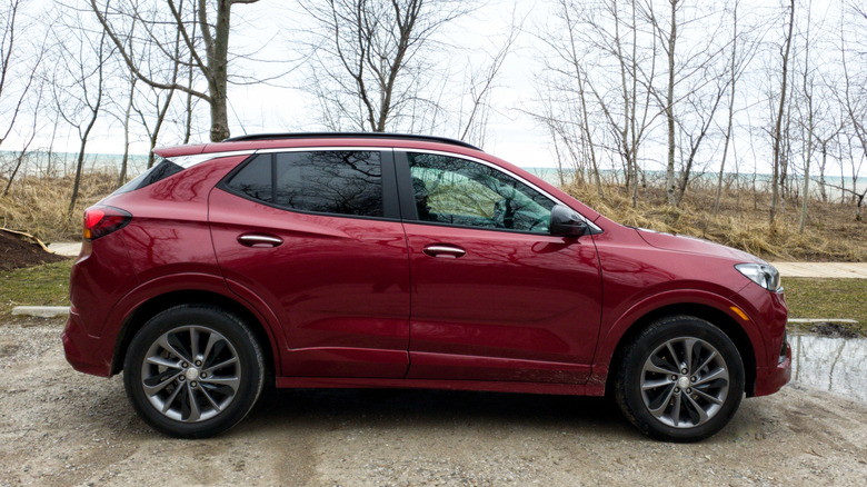 Red Buick Encore GX parking at the beach.