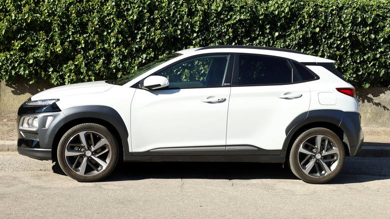 Hyundai Kona X parked at the roadside.