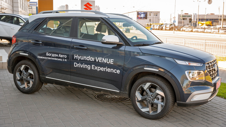A Hyundai Venue test drive SUV car outdoors on display