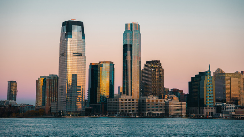 The New Jersey City skyline seen over the river.