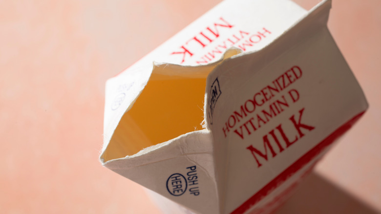Top down view of an open carton of milk