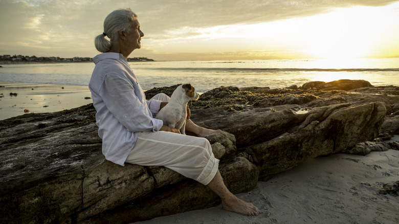 a retired woman on a beach