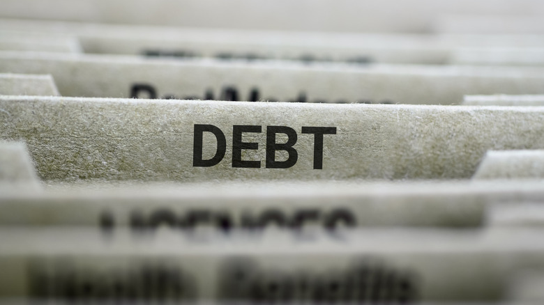 Closeup of folder tab labeled debt