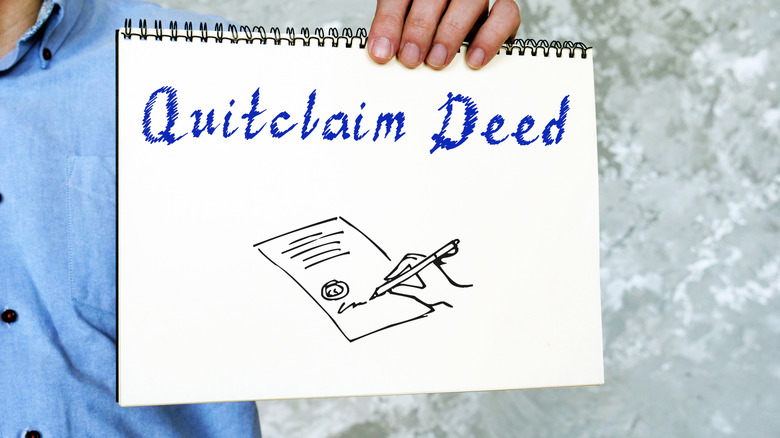 quitclaim deed on notepad