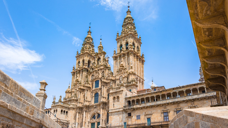 The Santiago de Compostela Cathedral against a blue sky.