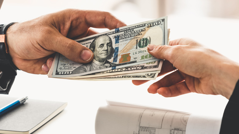 Money changing hands