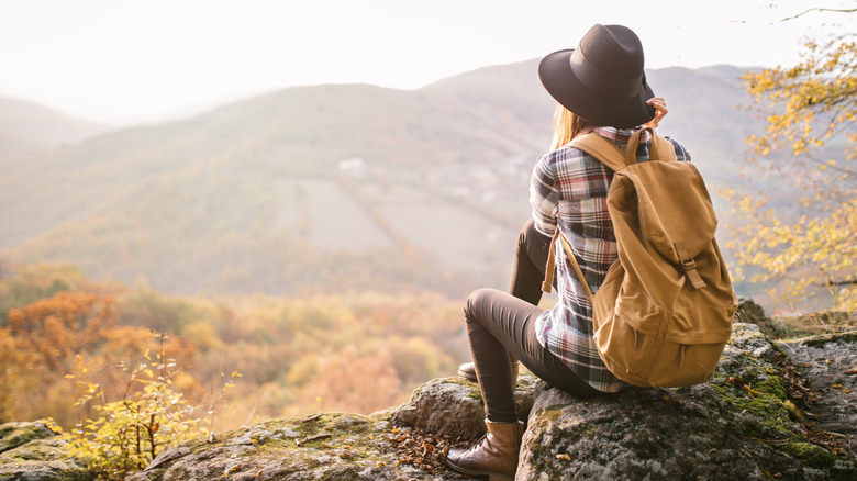 Women sitting at a view in flannel