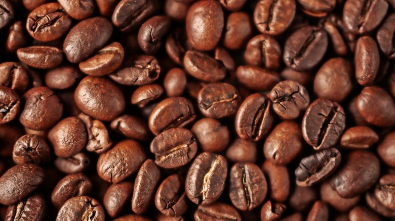 Roasted coffee beans close up.