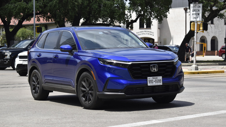 Blue Honda CRV on a street in Houston, Texas