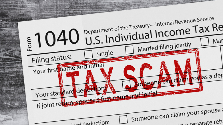 tax scam stamped on a 1040 form