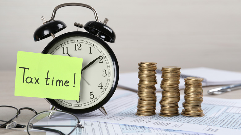 tax time note on a clock