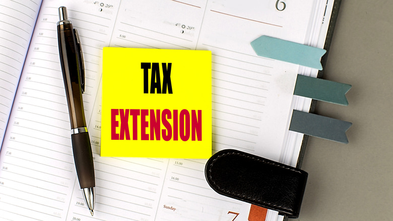 tax extension note on a calendar book