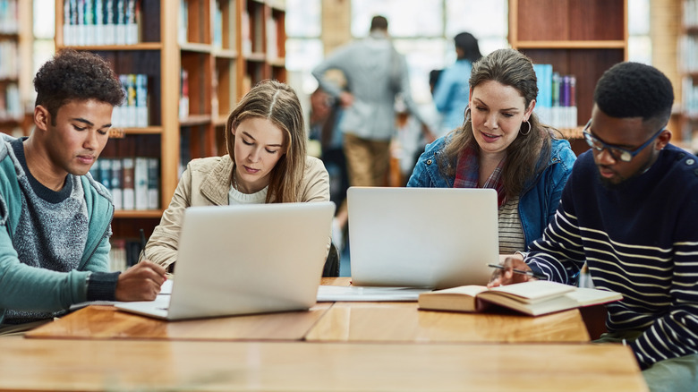 Group of students studying in library