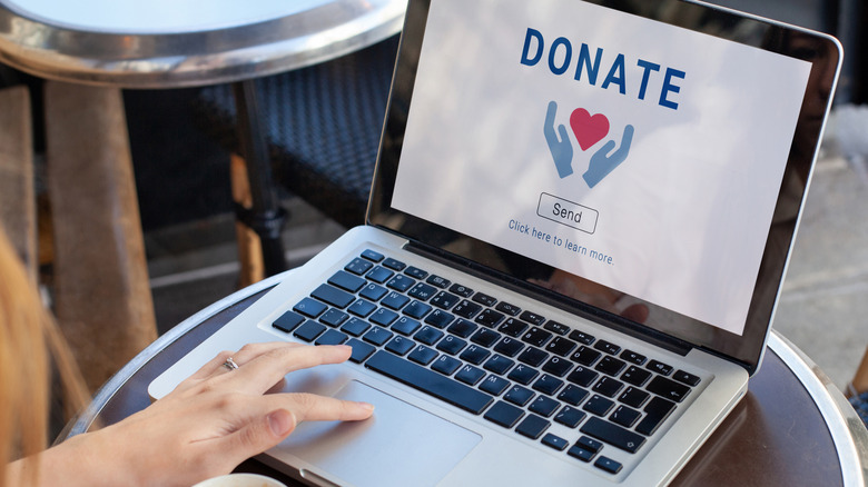 Laptop computer open to a charitable donation webpage