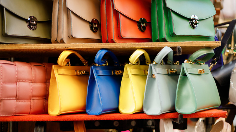 Colorful collection of stylish luxury handbags