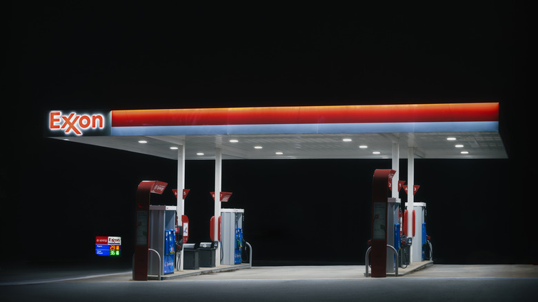Exxon gas pumps at night