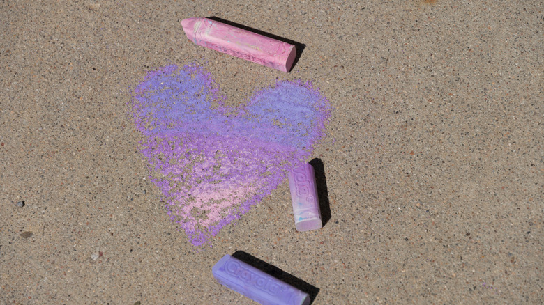 A sidewalk marked by chalk