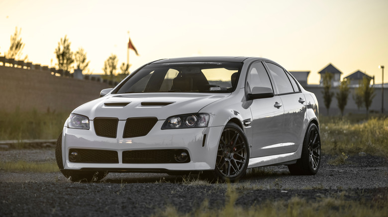 White Pontiac G8 parked.