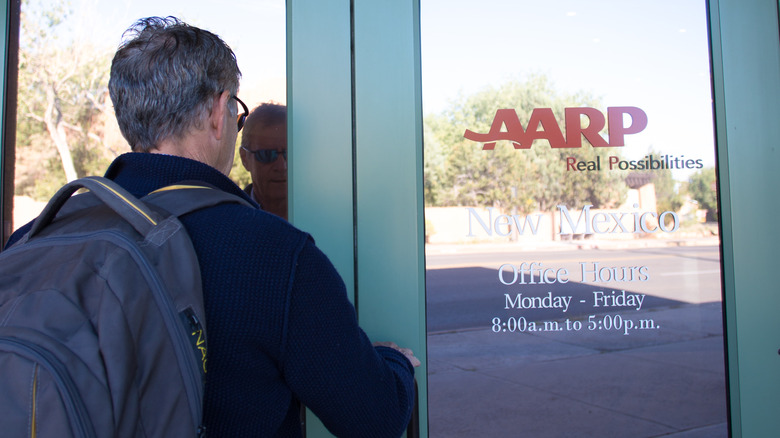 man entering an AARP office