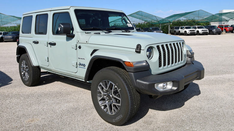Light blue Jeep Wrangler Sahara outside the official dealership