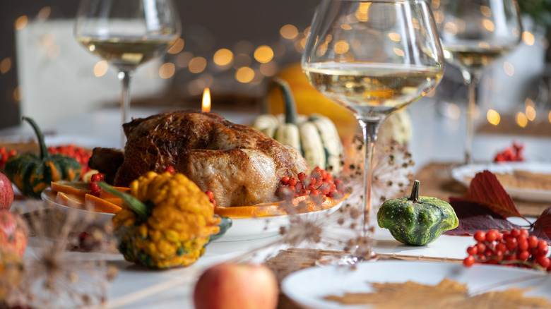 closeup of a table filled with food and drink