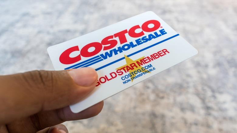 Someone holding a Costco card