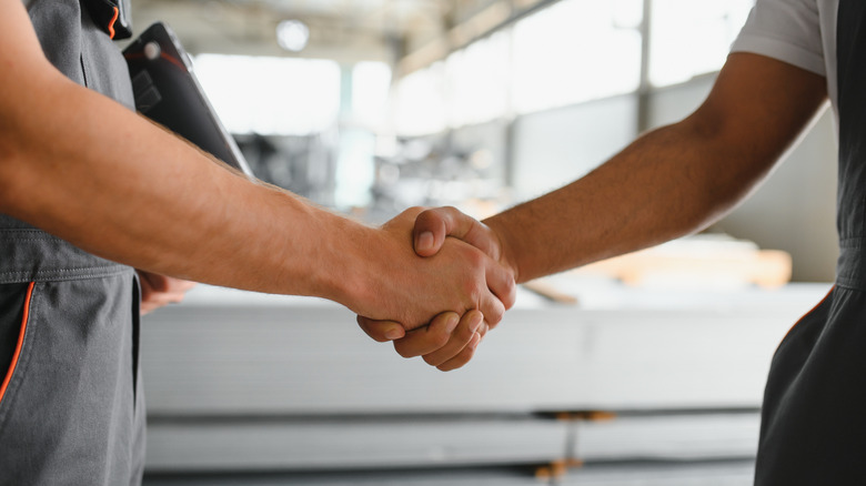 Two people shaking hands