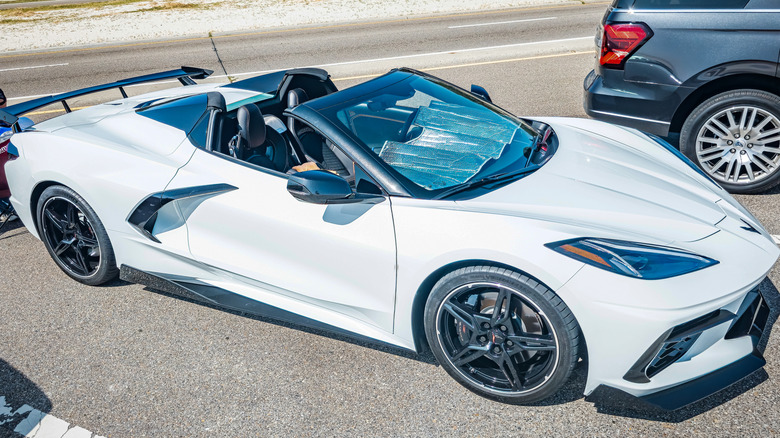 A white 2022 Chevrolet Corvette 2LT Convertible at a local car show.
