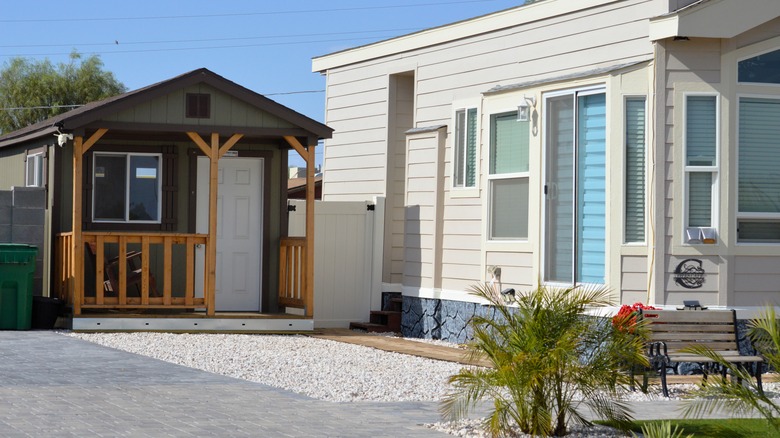 A new tiny home with side shed.