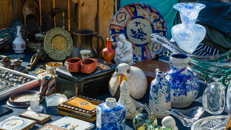 A mixture of glass and other items for sale