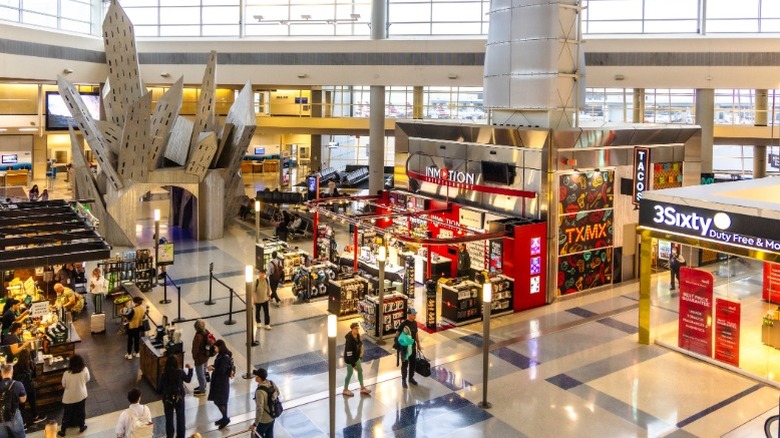 The interior of Dallas Fort Worth International Airport in Texas, the primary hub of American airlines.