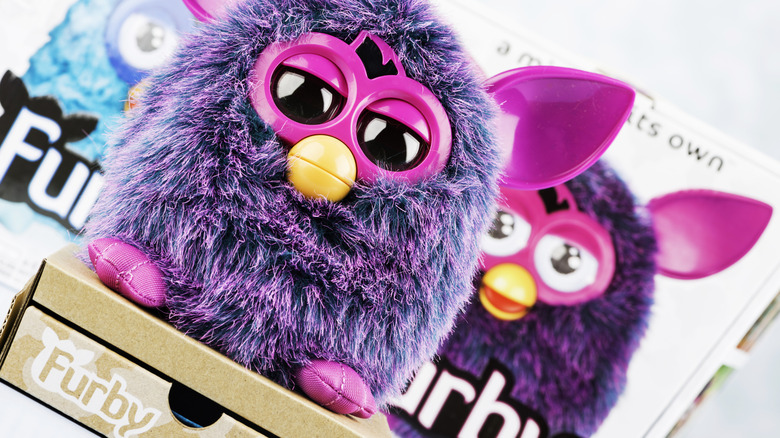 Furby toy on top of box