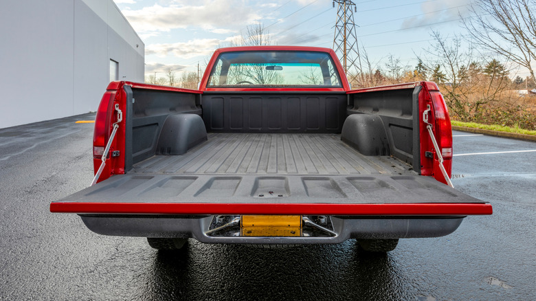 Open truck bed of a 2023 Chevrolet Silverado HD in parking lot