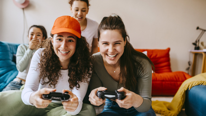 women playing nintendo