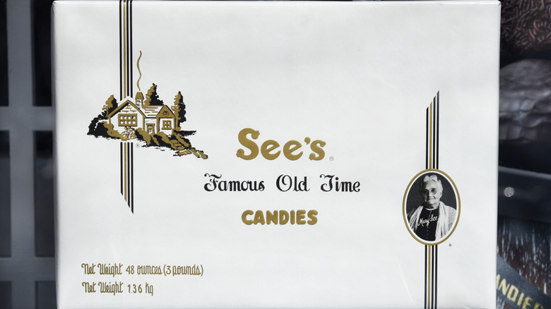 An iconic white box of See's Candies.