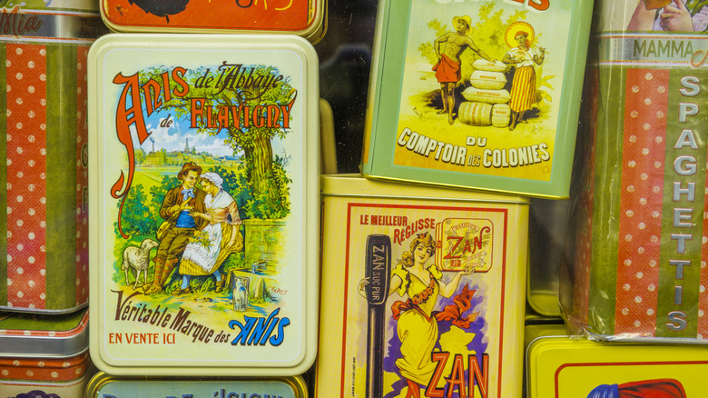 Different kids of decorated tins