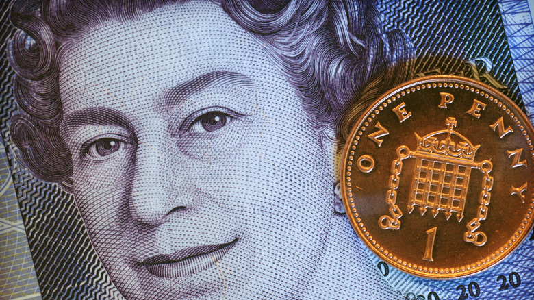 Queen Elizabeth's image on paper currency with a penny