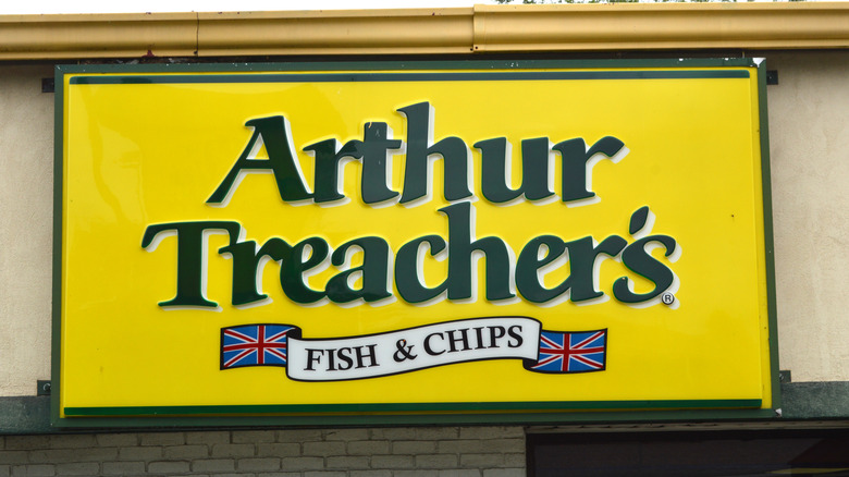 An Arthur Treachers Fish and Chips restaraunt signboard.