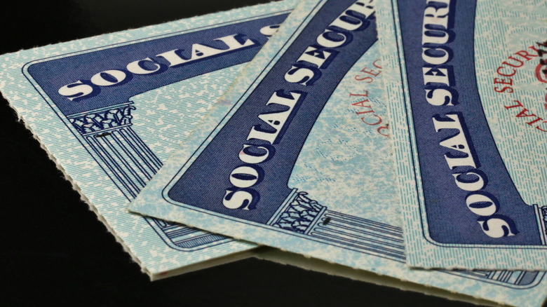 Social Security cards stacked on top of each other